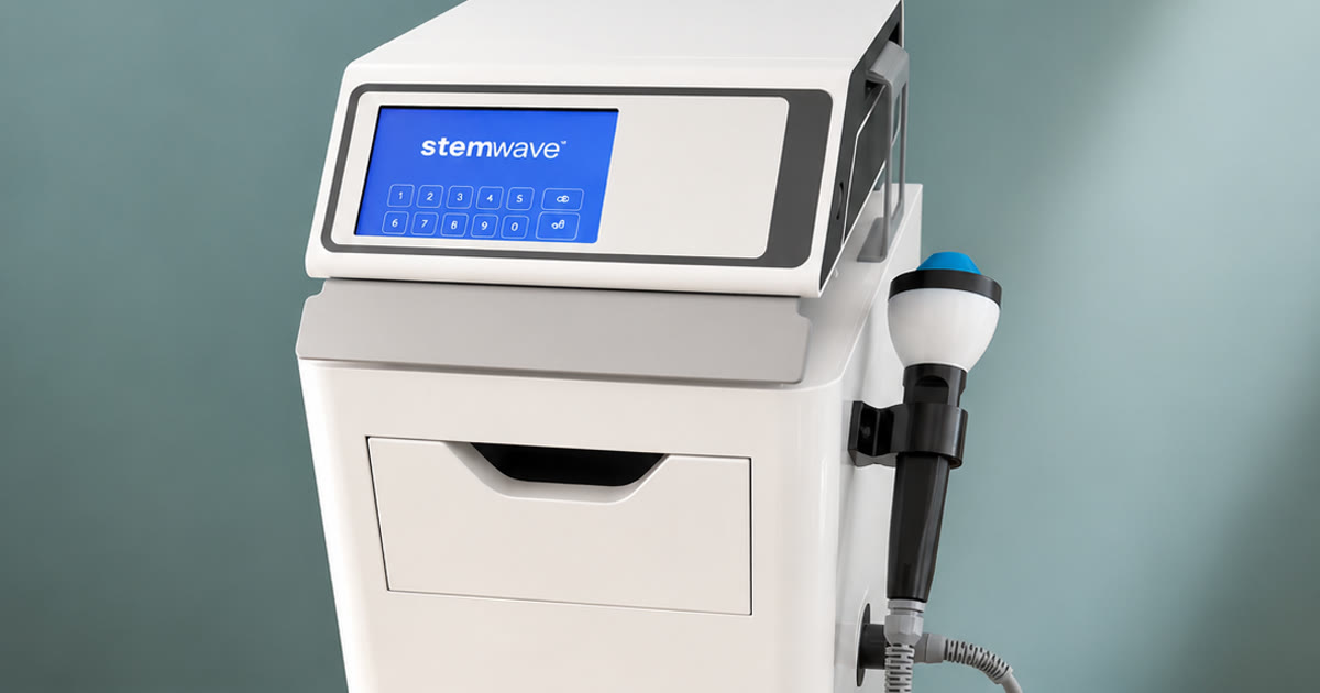 StemWave acoustic wave therapy unit with treatment handpiece at Total Wellness Chiropractic in Bowie, MD