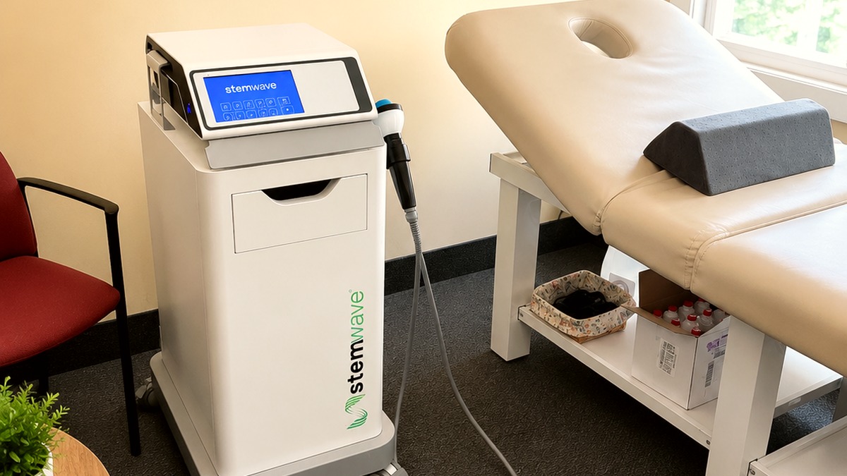 Patient receiving StemWave acoustic wave therapy at Total Wellness Chiropractic in Bowie, MD